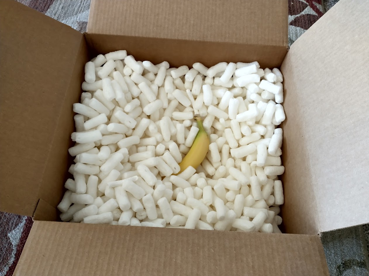 banana in large empty box